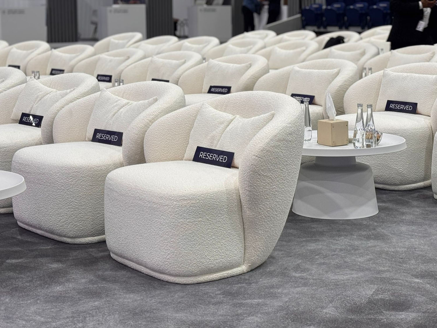 Lounge chair positioned within a stylish networking area.
